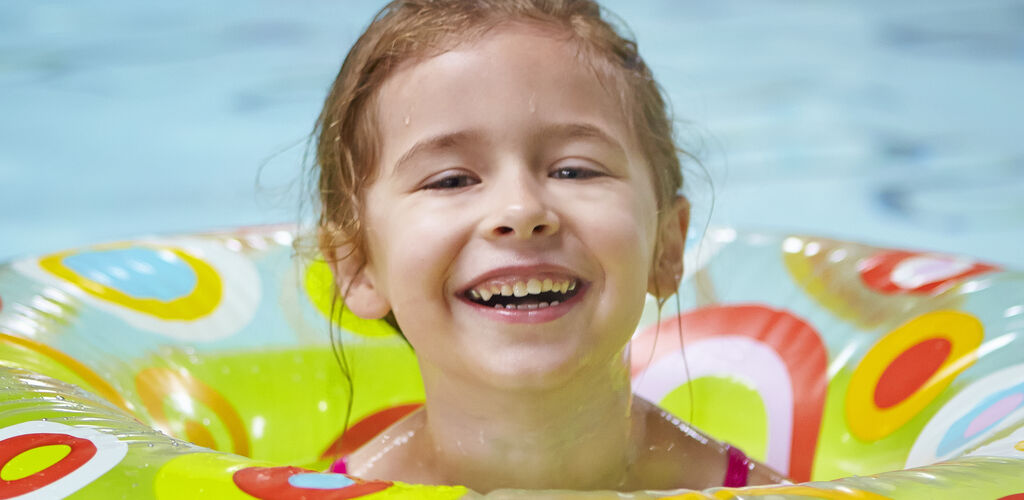 Girl playing in the pool